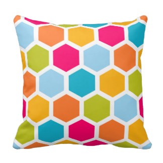square geometric cushion with bright colours